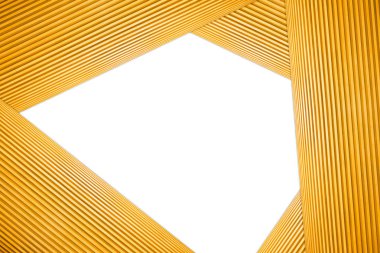 Yığılmış altıgen çerçeve ışık kahverengi ahşap izole beyaz arka plan üzerinde.