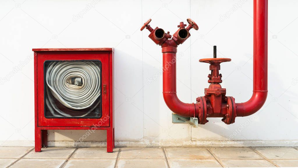 Water valve fire and fire hose old with Fire hose cabinet red color, Wall mounted.