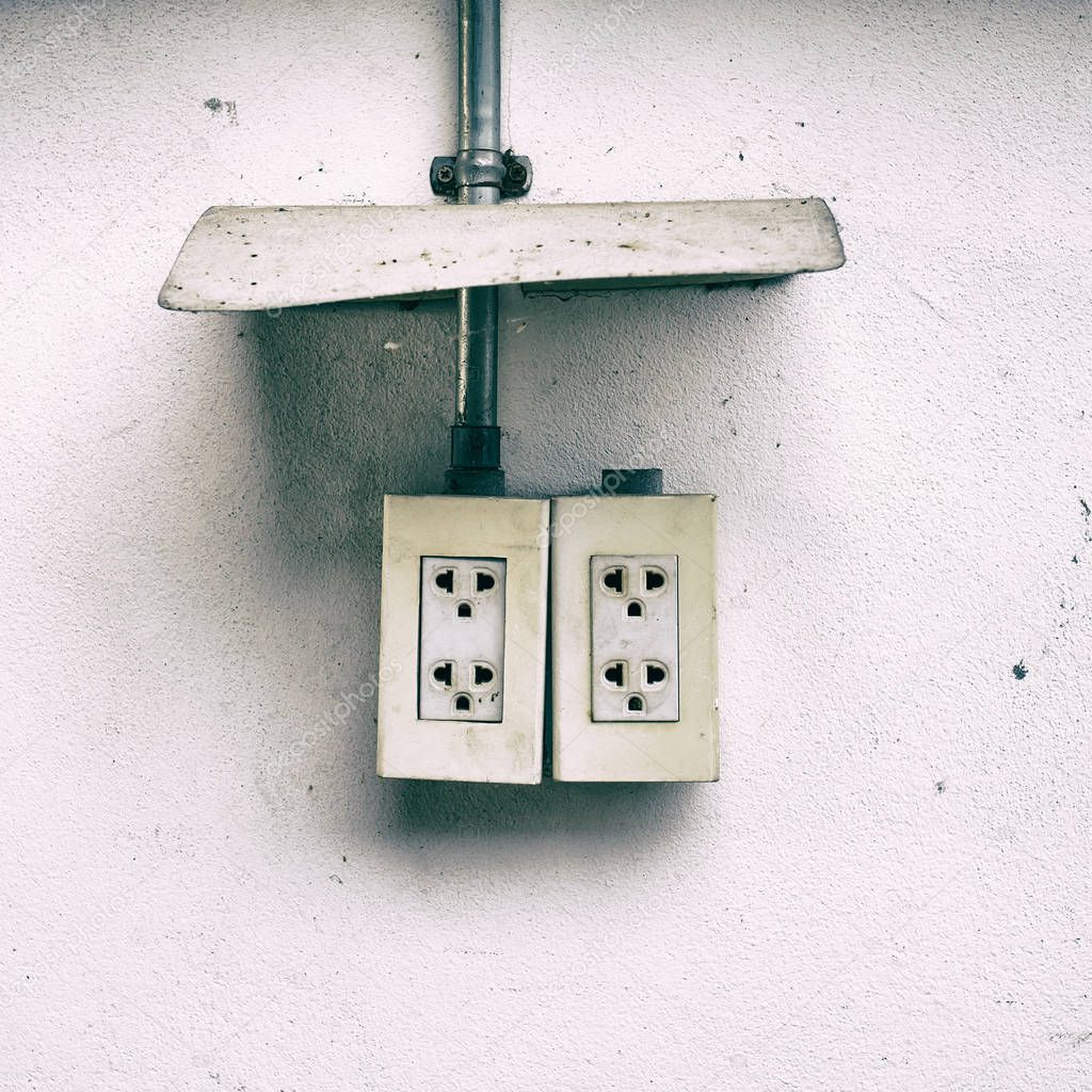 old wall Plugs Mounted on the wall.