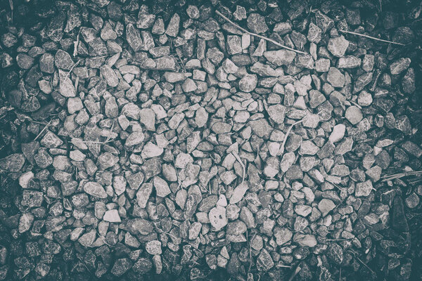 Small stone on the floor, vintage tone.