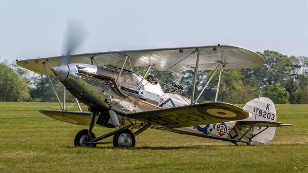 Biggleswade, UK - 6th May 2018:  A 1937 Hawker Demon vintage biplane landing at airfield