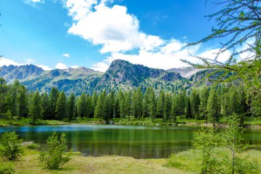 San Pellegrino lake in San Pellegrino pass: a high mountain pass in the Italian Dolomites clipart