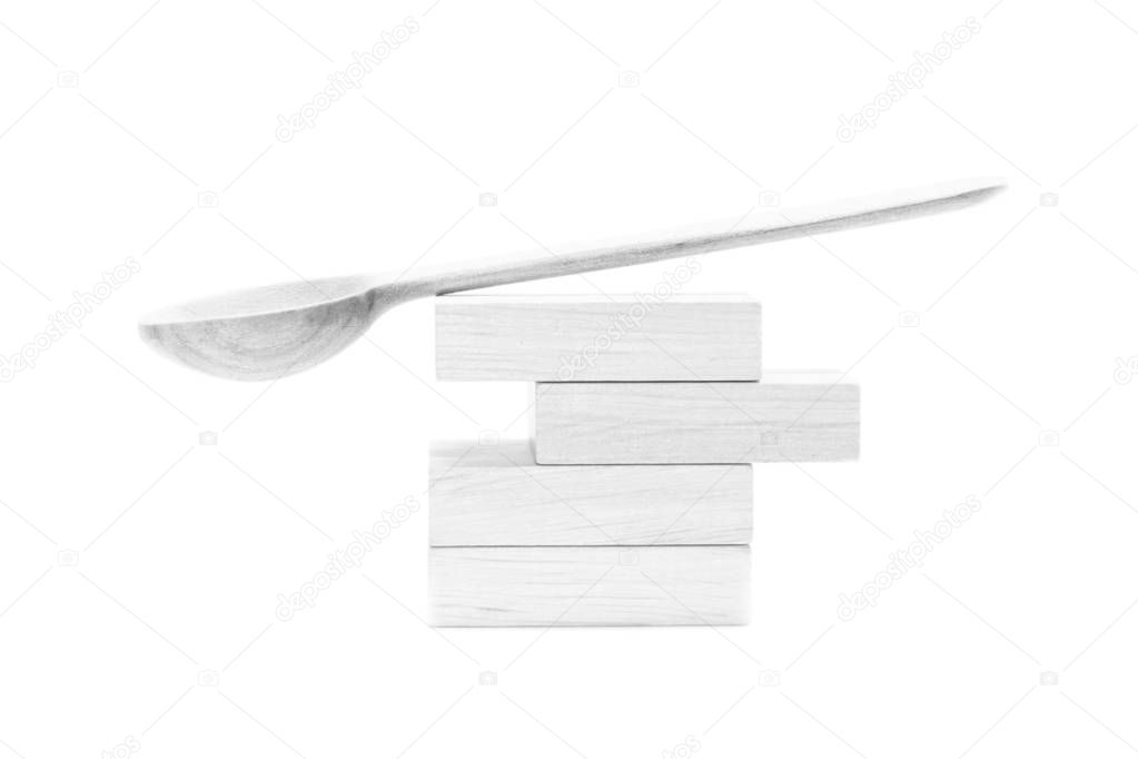 Wooden spoon in balanced position