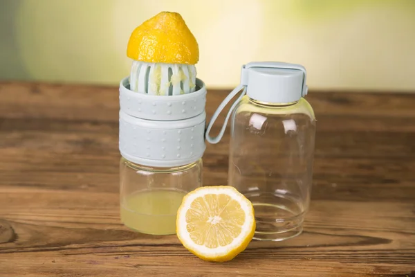 carafe with water, lemon