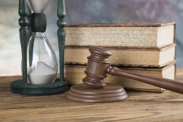 Lawyers office background. Law symbols composition on gray stone background.