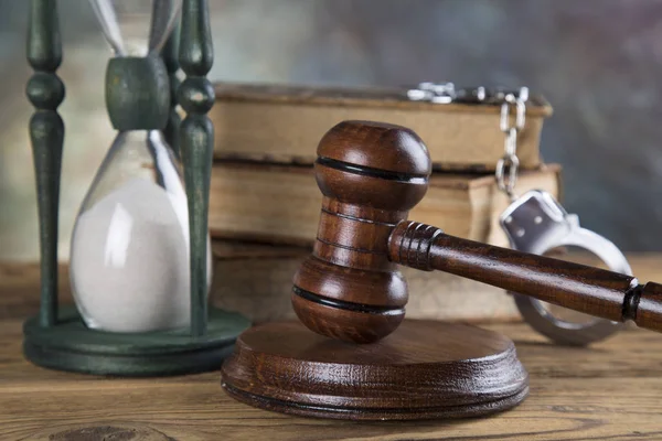 Lawyers office background. Law symbols composition on gray stone background.