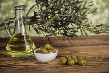 Olive oil, olive tree and green olives, bottles of olive oil clipart