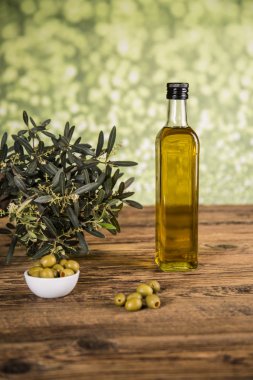 Olive oil, olive tree and green olives, bottles of olive oil. clipart