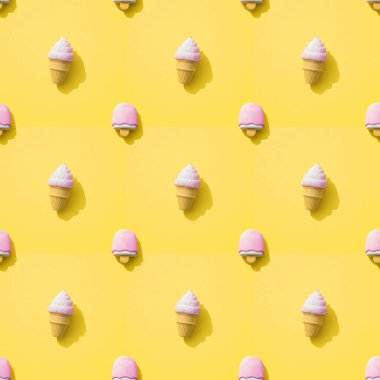 Sarı arka planda dondurmalı desen. Kusursuz desen