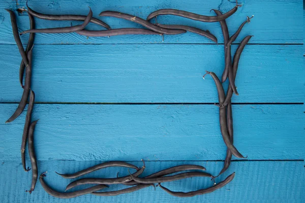 Kuşkonmaz fasulyesinden yapılmış bir çerçeve sebze proteininin kaynağıdır. Sağlıklı beslenme kavramı. Kopi alanı için yer