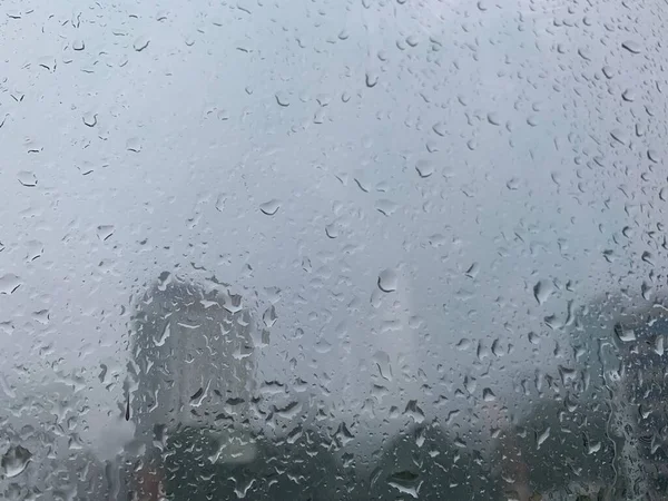 Regentropfen Auf Dem Glas Mit Blick Auf Die Stadt Als — Stockfoto