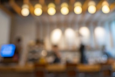 Bulanık Vietnam kahvecisi ya da soyut Bokeh ışıklandırması geçmişi olan bir kafe restoranı. Montaj ürün görüntüsü oluşturmak için. Yiyecek ve içecek konsepti