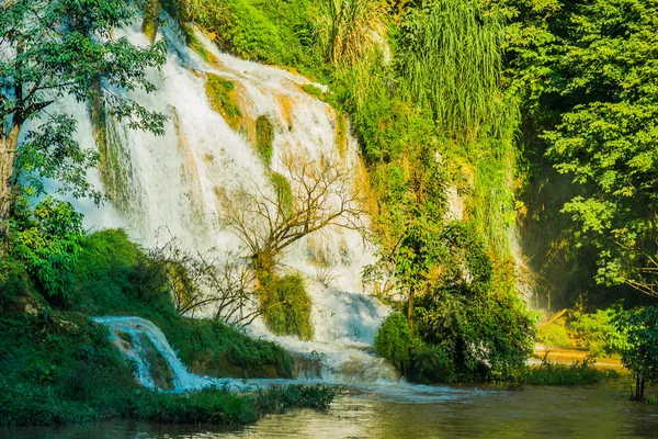 Dai Yem waterfall and red heart bridge. This is a nice waterfall in Moc Chau, Son La province, Vietnam. Travel and nature concept.