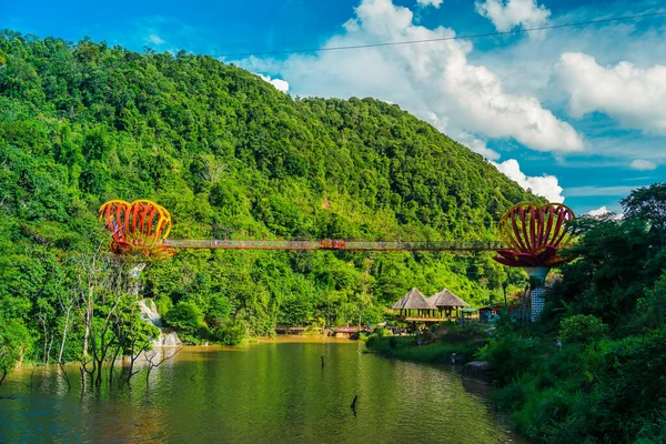 Dai Yem waterfall and red heart bridge. This is a nice waterfall in Moc Chau, Son La province, Vietnam. Travel and nature concept.