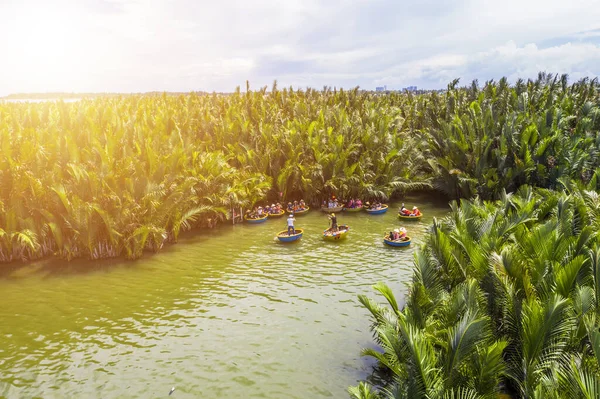 Aerial view a basket boat tour at the coconut water ( mangrove palm ) forest in Cam Thanh village, Hoi An, Bamboo Basket Boats Near Hoi An Ancient Town. Travel and landscape concept.
