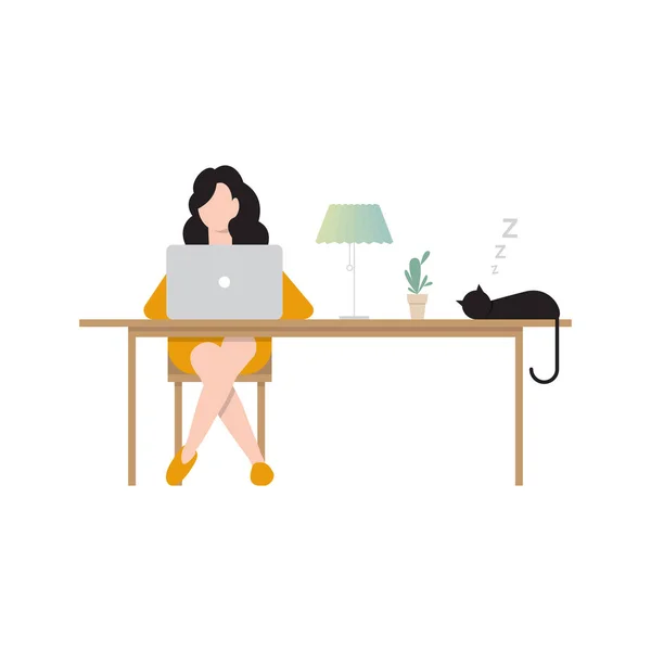 Woman sitting at desk and working at computer at home