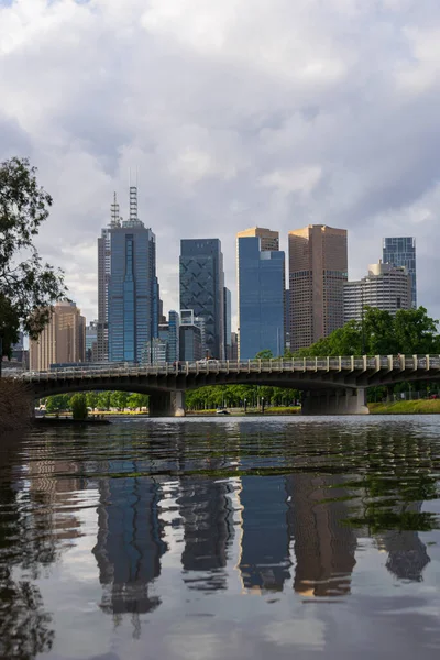 Rippled water reflections of the Melbourne CBD.