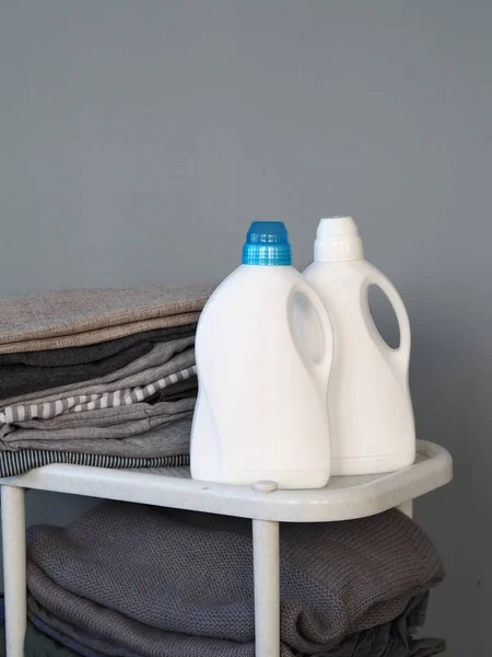 Two White Plastic Bottles Detergent Stack Gray Linen Different Shades — Stock Photo, Image