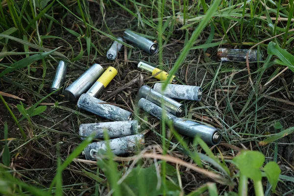 Soil pollution, used oxidized batteries are thrown into the environment, household waste disposal.