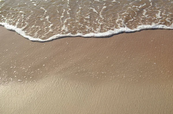 Meereswelle Sandstrand Hintergrund — Stockfoto