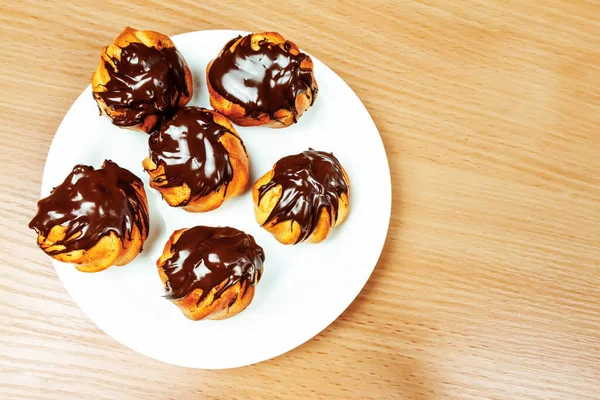 Produkten Tillverkad Mjöl Ägg Socker Ovanifrån Täckt Med Choklad — Stockfoto