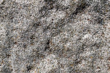 Gri desenli oyma taş arka planda tümsekler