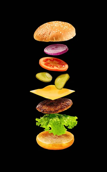 Burger Flying Ingredients Black Background Delicious Hamburger Air Food Levitation — Stock Photo, Image