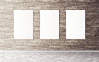Duvardaki boş beyaz tuvaller. Tasarım önizlemeniz için bir model. Reklam malzemeleri için iyi bir kullanım.