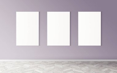 Duvarda üç tane boş tuval var. Tasarım önizlemeniz için bir model. Reklam malzemeleri için iyi bir kullanım.