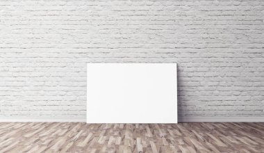 Yerde beyaz yatay tuval var. Tasarımın için boş bir model. Reklam için iyi bir kullanım.