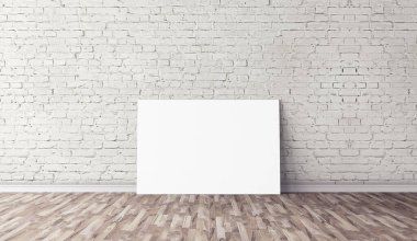 Yerde beyaz yatay tuval var. Tasarımın için boş bir model. Reklam için iyi bir kullanım.