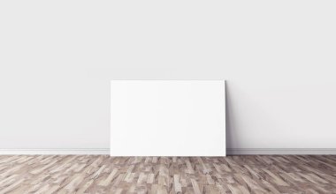 Yerde beyaz yatay tuval var. Tasarımın için boş bir model. Reklam için iyi bir kullanım.