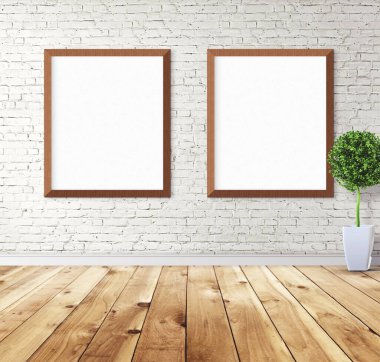 Duvarında çerçeve olan beyaz posterler. Tasarım ön gösterimi için hazırlan. Reklam malzemeleri için iyi bir kullanım.