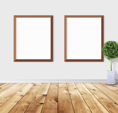 Duvarında çerçeve olan beyaz posterler. Tasarım ön gösterimi için hazırlan. Reklam malzemeleri için iyi bir kullanım.