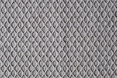 beige colored woven fabric with diamond pattern
