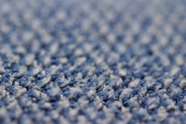 Macro abstract art texture background of a woven cotton terrycloth fabric with attractive worn texture