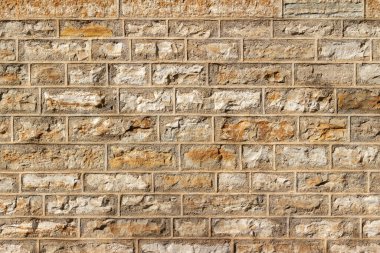 Antik 19. yüzyıl kireçtaşı duvar dokusu arkaplanı, kıstırılmış havan topu onarımı