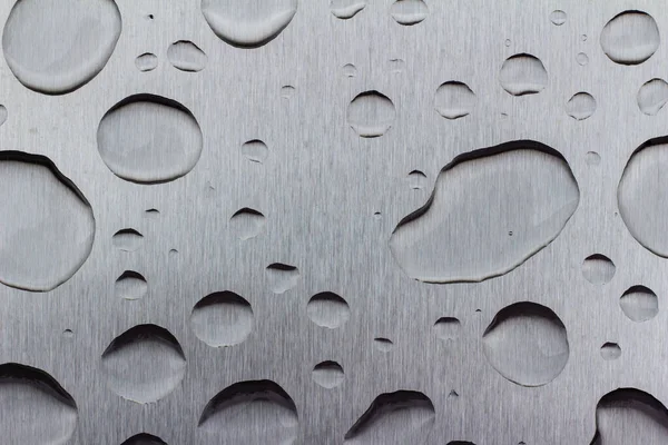 概要平滑なステンレス表面の雨滴のアートテクスチャの背景 — ストック写真