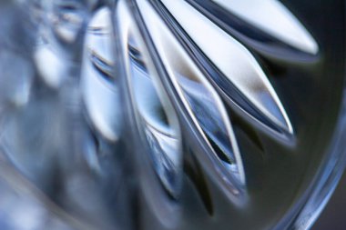 Yıldız patlaması tasarımları ile odaklanmış kurşun cam dokusunun makro soyut sanat görüntüsü