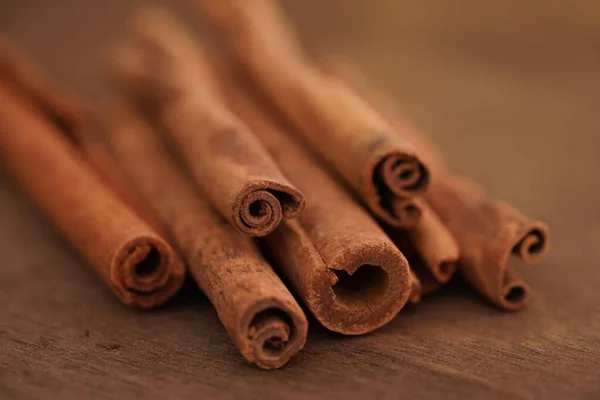 Selective Focus Macro Photo Cinnamon Sticks Wooden Brown Background Christmas — Stock Photo, Image