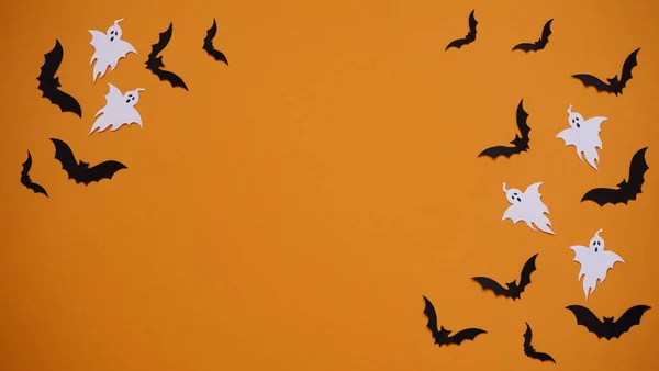 Halloween Holiday Concept Black Paper Bats Ghosts Bright Orange Background — Stock Photo, Image