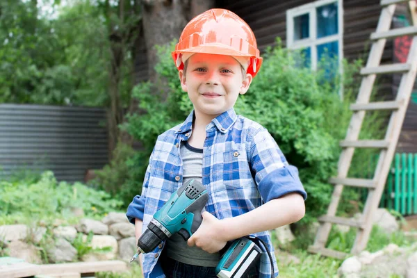 Preschooler Boy Protective Construction Helmet Stands Street Holding Electric Screwdriver — Stock Photo, Image