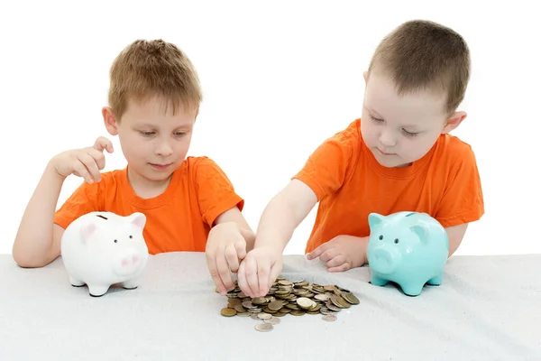 Two Boys Orange Shirts White Background Sit Table Add Count Stock Image