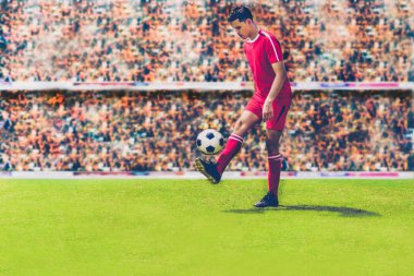 Futbol ya da futbol oyuncu ile top sahada tekme için futbol topu Futbol Stadyumu, yumuşak odak ayakta