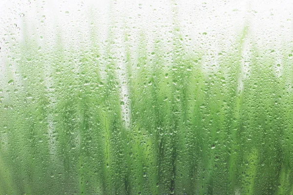 Cae lluvia sobre la ventana —  Fotos de Stock