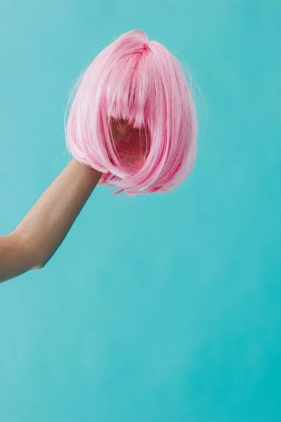 Hand Holding Pink Wig Blue Background — Stock Photo, Image