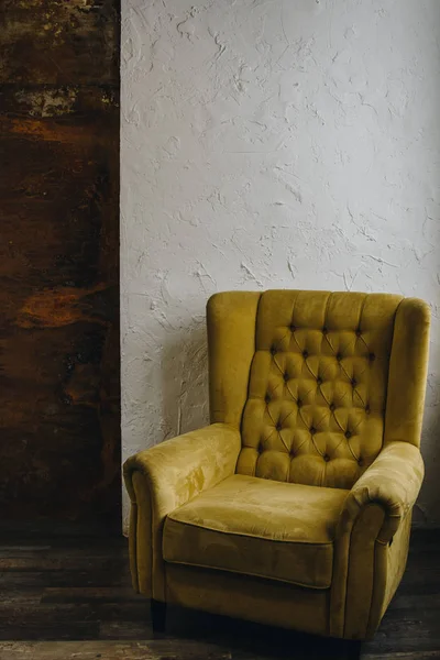 Yellow chair in loft studio room