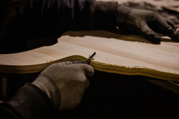 Carpenter using gouge for wood — Stock Photo, Image