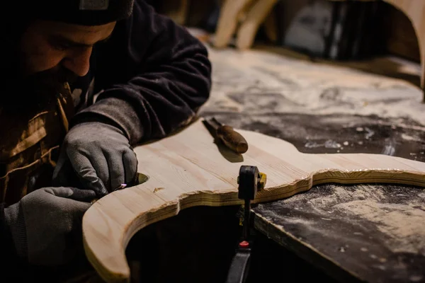 Carpenter using gouge for wood — Stock Photo, Image