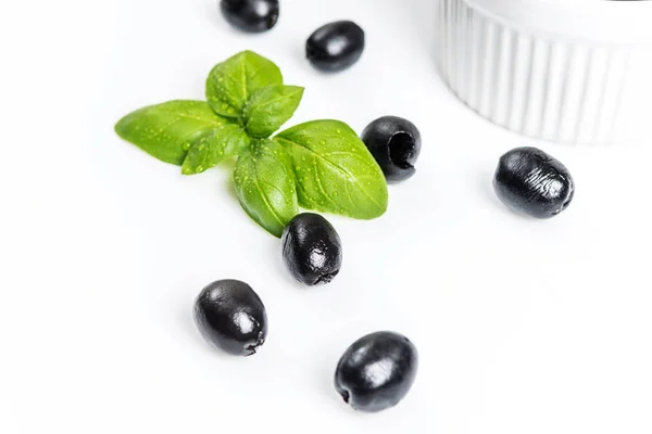 Black olives on white — Stock Photo, Image